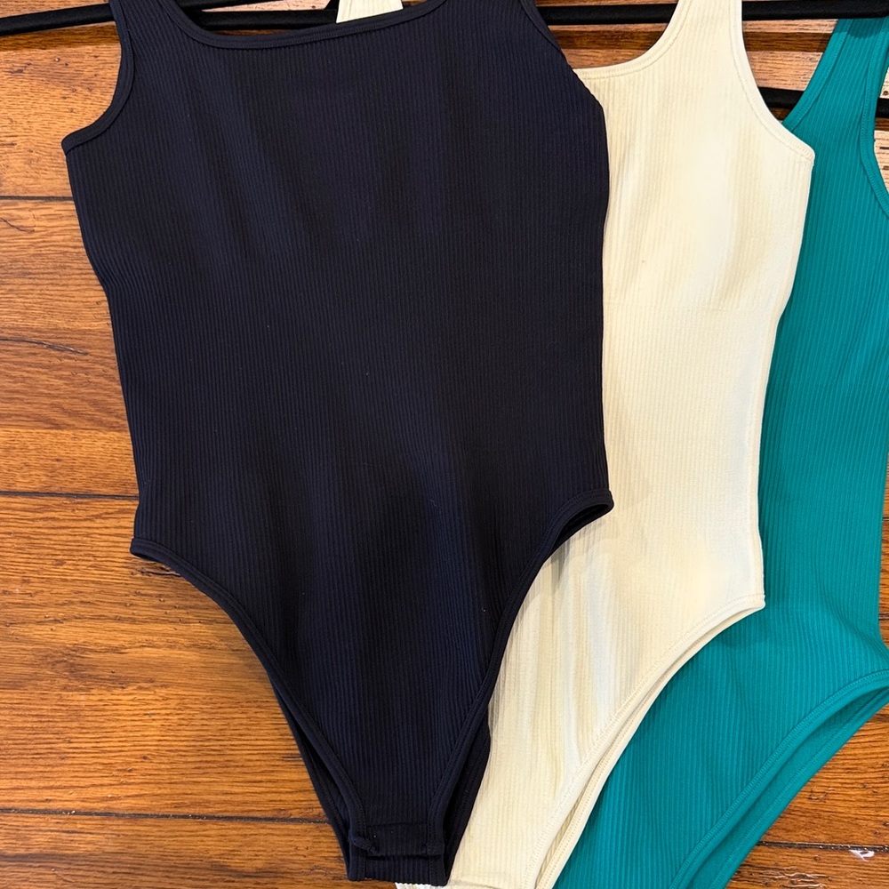 Stylish Bodysuit Trio - Black, Cream, and Green